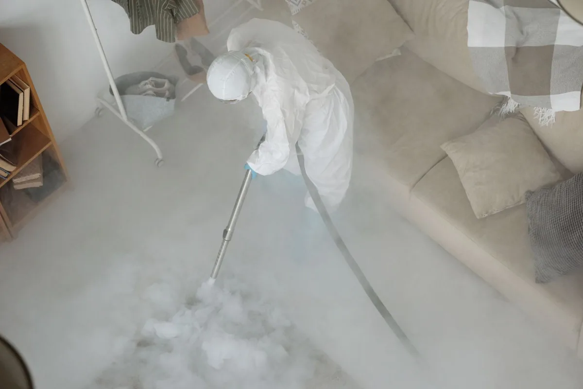 Biohazard cleanup technician in protective equipment, Richmond Heights, Orlando, FL